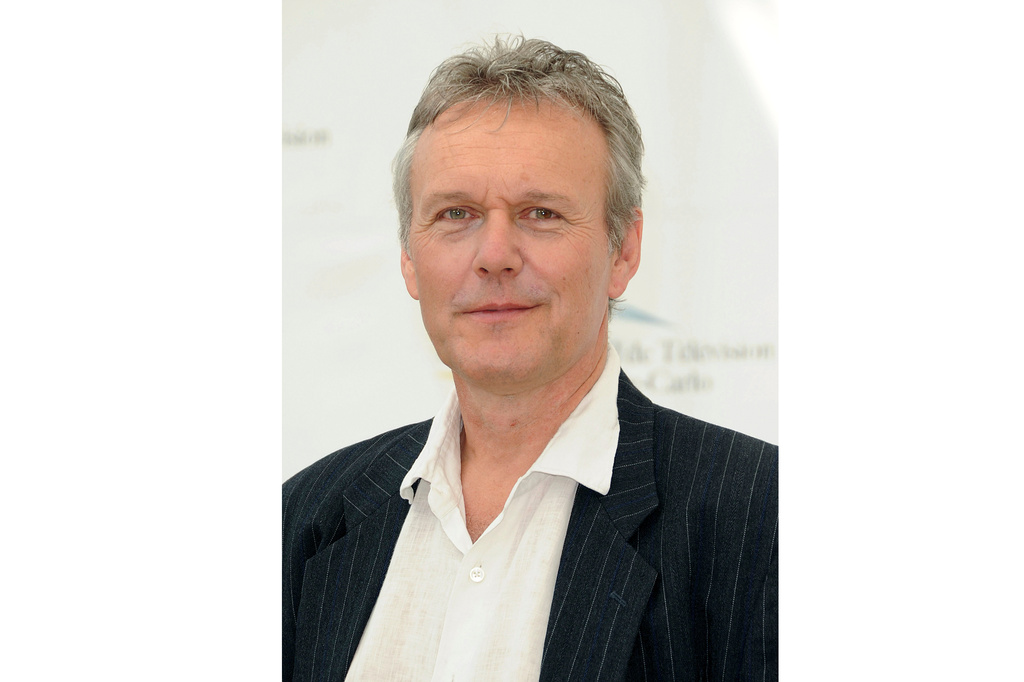 FILE - Anthony Head poses during the "Merlin" photocall at the 51st Monaco Television Festival in Monte Carlo, Monaco, Friday, June 10, 2010. (AP Photo/Christian Alminana, File)