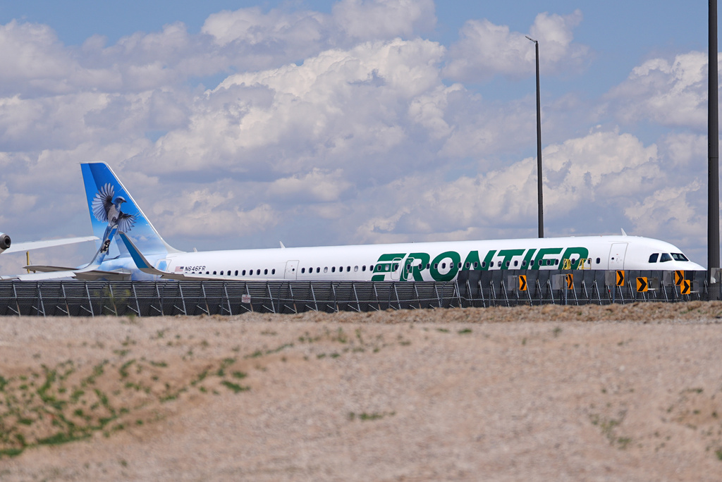 Frontier Airlines jetliner number n646fr sits outside the airlines technical operations center with other jetliners in for service north of Denver International Airport Saturday, May 9, 2026, in Denver. (AP Photo/David Zalubowski)