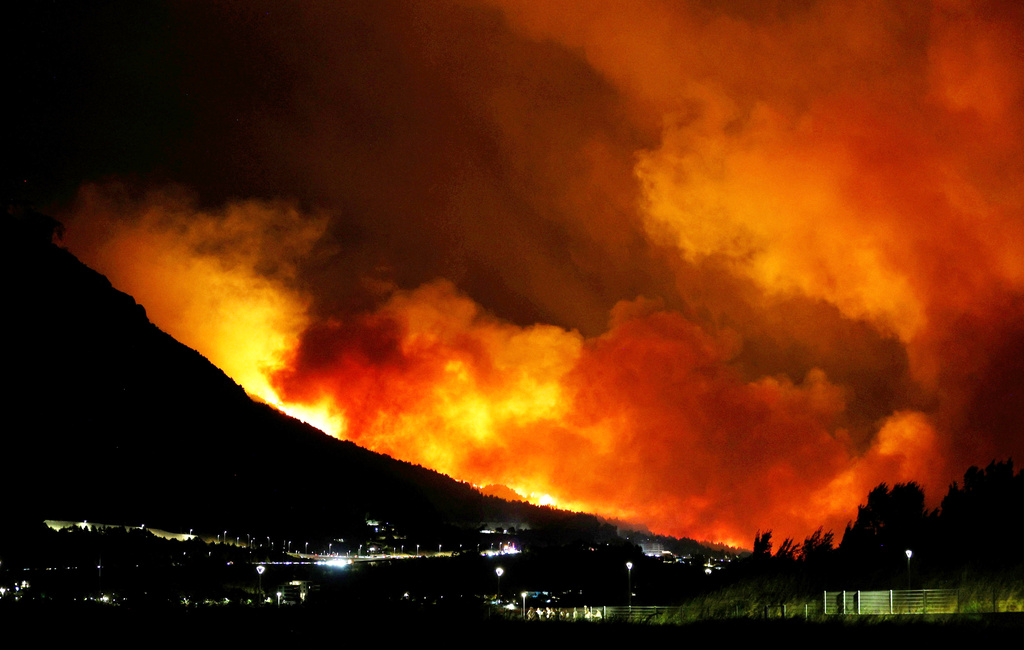 A general view of a wildfire near Omis, southern Croatia early Friday, Aug. 14, 2026. (AP Photo/Jakov Prkic)