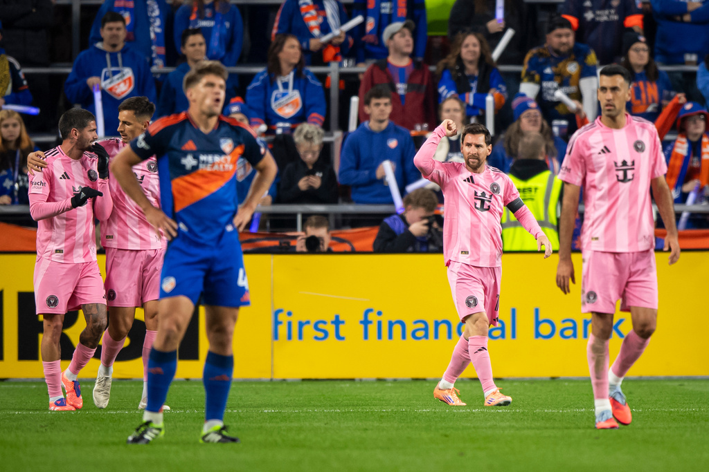 Inter Miami forward Lionel Messi, second from right, celebrates after scoring during the first half of MLS soccer's Eastern Conference semifinal against FC Cincinnati, Sunday, Nov. 23, 2025, in Cincinnati. (AP Photo/Tanner Pearson)