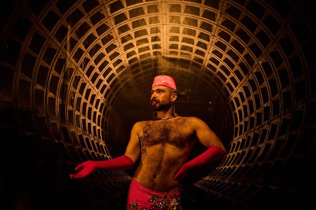 Haidar Darwish, a Syrian belly dancer with the Berlin-based LGBTQ collective Queens Against Borders, prepares backstage before an open-air show in Berlin, Germany, Friday, July 17, 2026. (AP Photo/Ebrahim Noroozi)