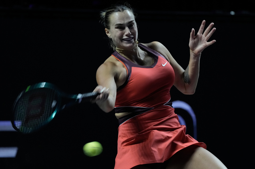 Aryna Sabalenka of Belarus plays a shot against Jessica Pegula of the United States during their women's singles match of the WTA finals in Riyadh, Saudi Arabia, Tuesday, Nov. 4, 2025. (AP Photo/ Fatima Shbair)