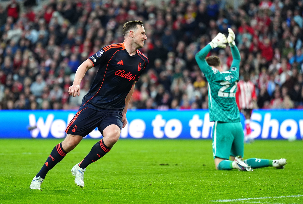 Nottingham Forest's Chris Wood, left, celebrates scoring their second goal during the Premier League soccer match between Sunderland and Nottingham Forest, Friday, April 24, 2026, in Sunderland, England. (Owen Humphreys/PA via AP)