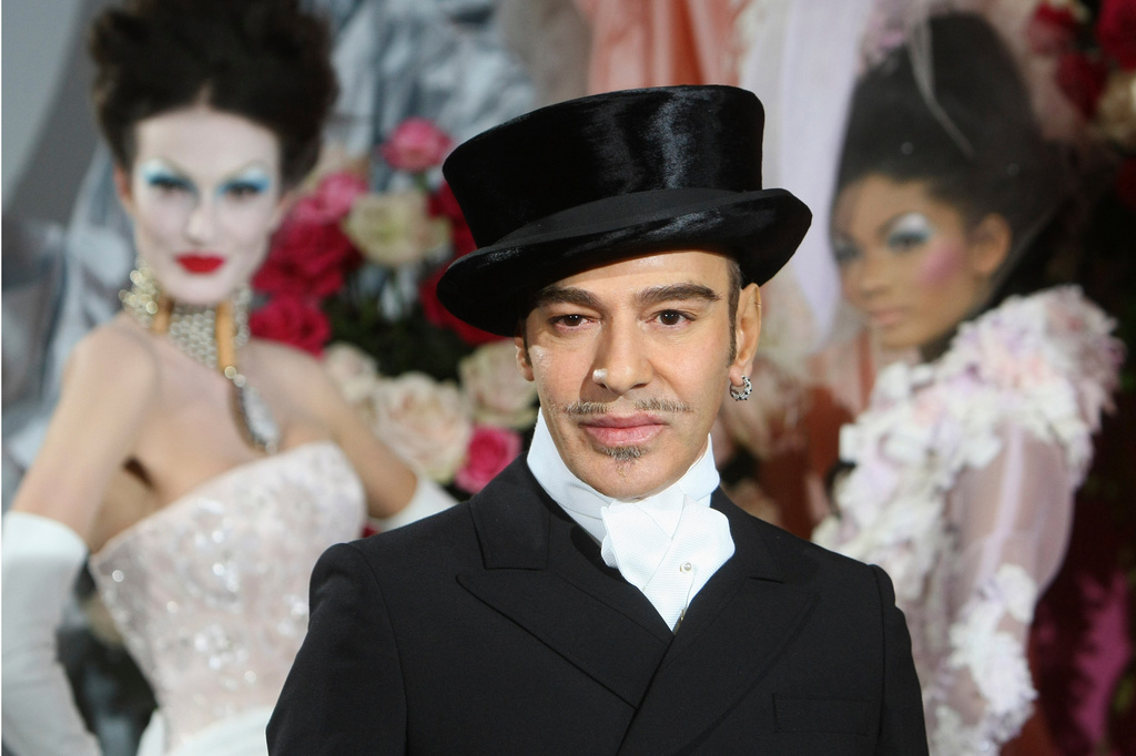 FILE - Fashion designer John Galliano poses at the end of the presentation of the Dior Haute Couture spring/summer 2010 fashion collection on Jan. 25, 2010, in Paris. (AP Photo/Jacques Brinon, File)