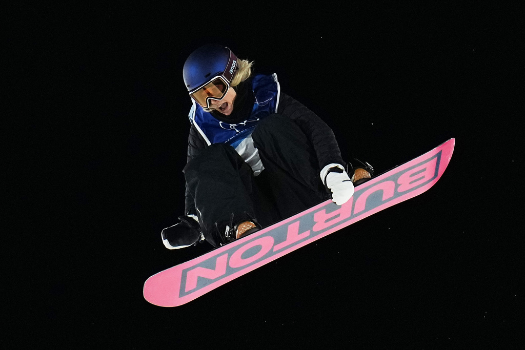 Austria's Anna Gasser competes during the women's snowboard big air qualifications at the 2026 Winter Olympics, in Livigno, Italy, Sunday, Feb. 8, 2026. (AP Photo/Gregory Bull)