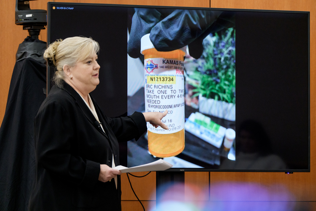 Kathy Nester, the defense attorney for Kouri Richins, a Utah mother accused of fatally poisoning her husband, shows the jury an image of a pill bottle while delivering her opening statement in Richins' murder trial at the Summit County Courthouse in Park City, Utah, Monday, Feb. 23, 2026. (AP Photo/Spenser Heaps, Pool)