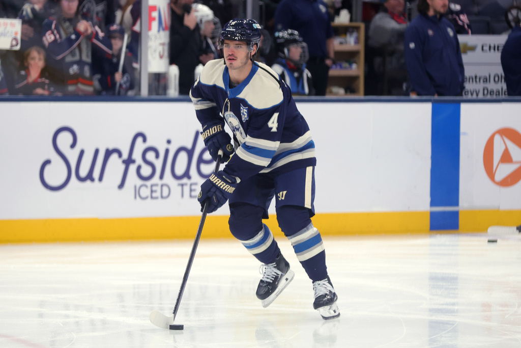 Columbus Blue Jackets forward Cole Sillinger warms up before an NHL hockey game against the New Jersey Devils in Columbus, Ohio, Wednesday, Dec. 31, 2025. (AP Photo/Paul Vernon)