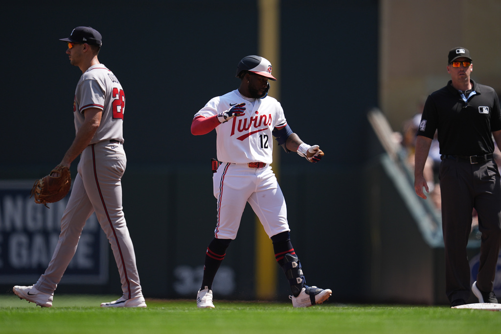 Minnesota Twins' Kaelen Culpepper (12) celebrates after hitting a single during the fifth inning of a baseball game against the Atlanta Braves, Wednesday, Aug. 19, 2026, in Minneapolis. (AP Photo/Abbie Parr)
