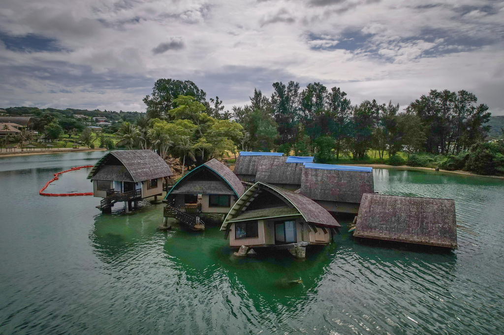 FILE - The once iconic Holiday Inn villas in Port Vila, Vanuatu, sit partially sunken, July 19, 2025, after being hit by multiple cyclones and an earthquake that caused irreparable damage. (AP Photo/Annika Hammerschlag, File
