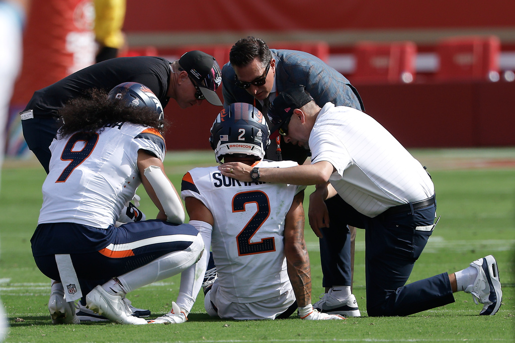 Denver Broncos cornerback Pat Surtain II (2) is tended to during the first half of an NFL football game against the San Francisco 49ers in Santa Clara, Calif., Sunday, Oct. 4, 2026. (AP Photo/Kelley L. Cox)