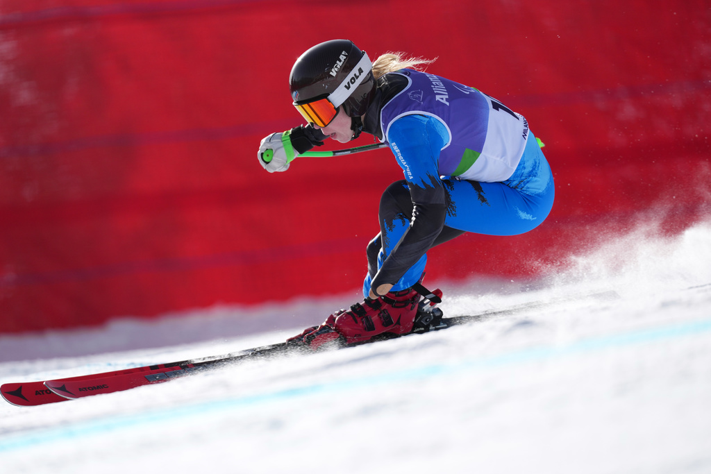 Varvara Voronchikhina, of Russia, competes in the alpine skiing women's downhill standing competition at the 2026 Winter Paralympics, in Cortina d'Ampezzo, Italy, Saturday, March 7, 2026. (AP Photo/Evgeniy Maloletka)