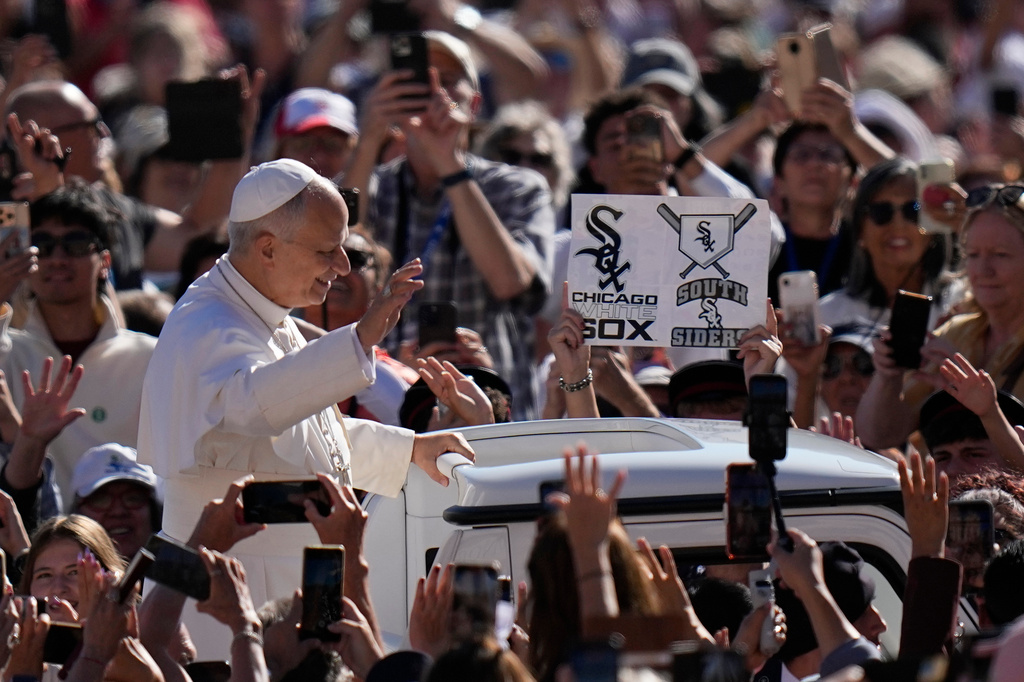 A Chicago White Sox supporter shows a banner as Pope Leo XIV arrives for his weekly general audience in St. Peter's Square, at the Vatican, Wednesday, Sept. 23, 2026. (AP Photo/Alessandra Tarantino)