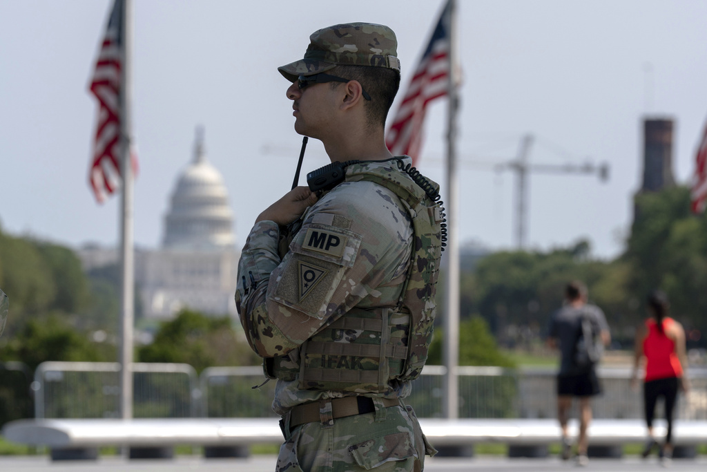Members of the Ohio National Guard patrol the National Mall, Sunday, Sept. 14, 2025, in Washington. (AP Photo/Jose Luis Magana)