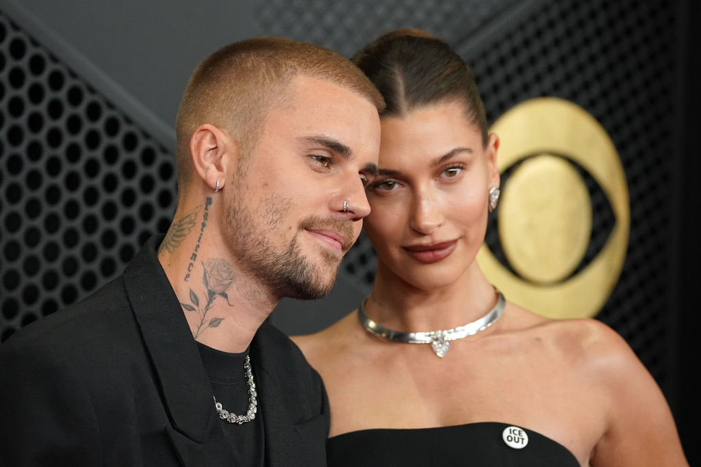 Justin Bieber, left, and Hailey Bieber arrive at the 68th annual Grammy Awards on Sunday, Feb. 1, 2026, in Los Angeles. (Photo by Jordan Strauss/Invision/AP)