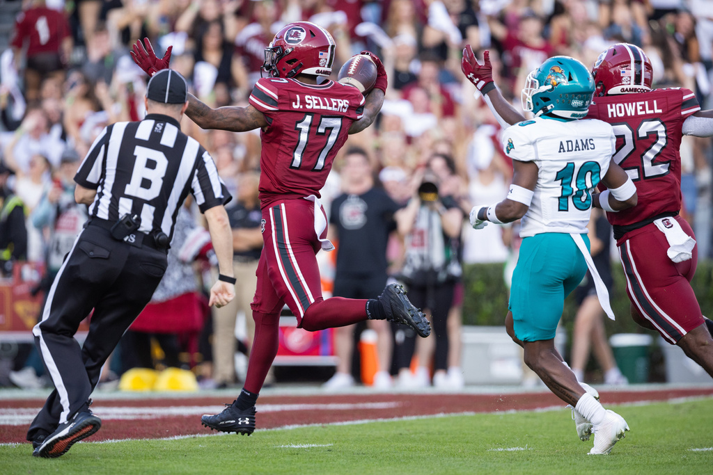 South Carolina wide receiver Jayden Sellers (17) runs in for a touchdown against the Coastal Carolina during the first half of an NCAA college football game, Saturday, Nov. 22, 2025, in Columbia, S.C. (AP Photo/Scott Kinser)