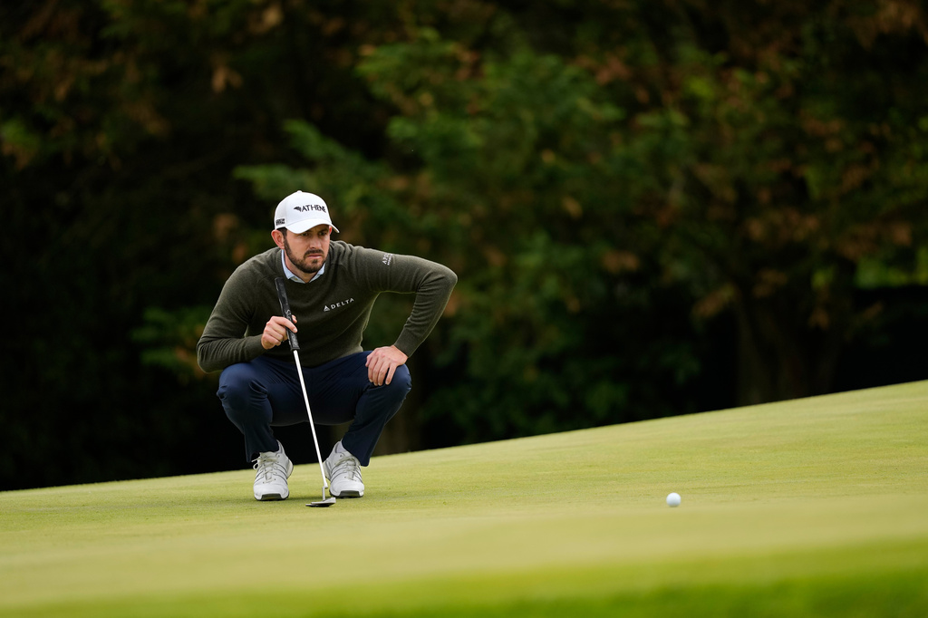 Patrick Cantlay studies his shot on the 12th green during the second round of the PGA Championship golf tournament at Aronimink Golf Club, Friday, May 15, 2026, in Newtown Square, PA. (AP Photo/Carolyn Kaster)