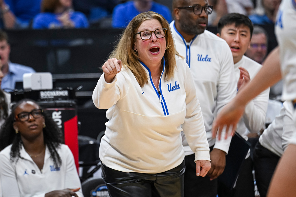 UCLA head coach Cori Close reacts against Minnesota during the second half in the Sweet 16 of the NCAA college basketball tournament Friday, March 27, 2026, in Sacramento, Calif. (AP Photo/Justine Willard)