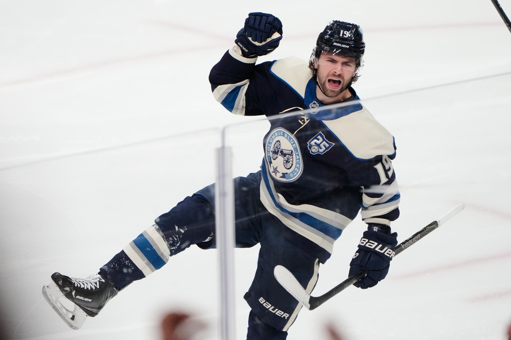 FILE - Columbus Blue Jackets center Adam Fantilli (19) celebrates a goal in the third period of an NHL hockey game against the Carolina Hurricanes in Columbus, March 31, 2026. (AP Photo/Sue Ogrocki, File)