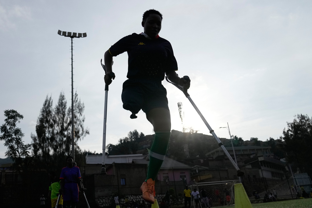 A soccer player on the Rwanda Amputee team takes part in a training session in Kigali, Rwanda, on Friday, March 20, 2026. (AP Photo/Brian Inganga)