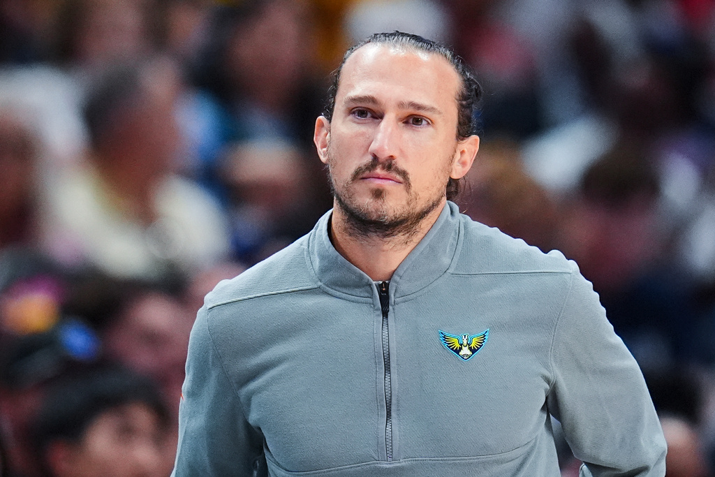 FILE - Dallas Wings head coach Chris Koclanes looks on during the first half of a WNBA basketball game against the Indiana Fever, Friday, Aug. 1, 2025, in Dallas. (AP Photo/Julio Cortez, FIle) FILE - Dallas Wings head coach Chris Koclanes looks on during the first half of a WNBA basketball game against the Indiana Fever, Friday, Aug. 1, 2025, in Dallas. (AP Photo/Julio Cortez, FIle)