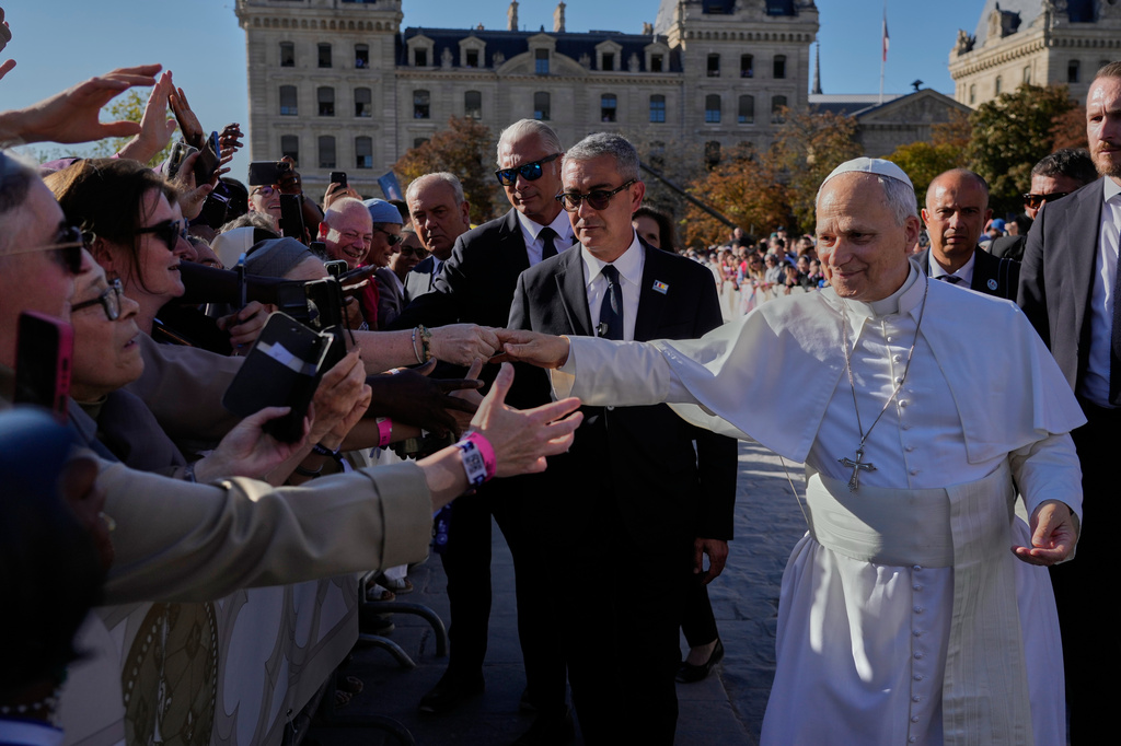 Pope Leo XIV arrives at Notre-Dame Cathedral to lead the vespers, Friday, Sept. 25, 2026, in Paris. (AP Photo/Gregorio Borgia)