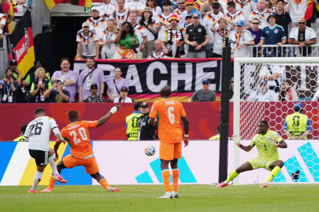 Germany's Deniz Undav (26) scores their second goal during the World Cup Group E soccer match between Germany and Ivory Coast in Toronto, Saturday, June 20, 2026. (Nathan Denette/The Canadian Press via AP)