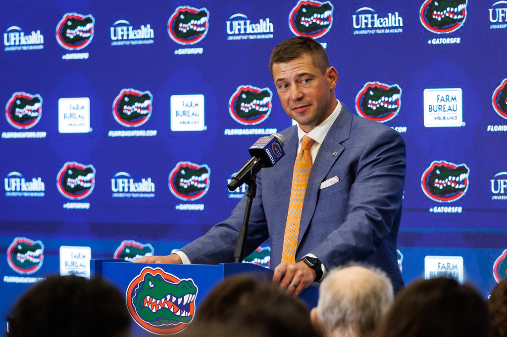 FILE - New Florida NCAA college football head coach Jon Sumrall speaks during a news conference, Dec. 1, 2025, in Gainesville, Fla. (AP Photo/Chris Watkins, File)
