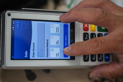 A shopper makes a purchase with food stamps on Monday, Oct. 27, 2025, in Los Angeles. (AP Photo/Damian Dovarganes) A shopper makes a purchase with food stamps on Monday, Oct. 27, 2025, in Los Angeles. (AP Photo/Damian Dovarganes)
