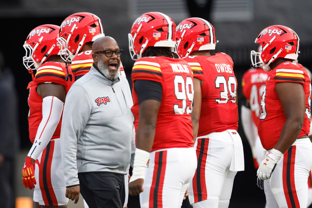 FILE - Maryland head coach Mike Locksley encourages his players before an NCAA football game against Northern Illinois, Sept. 5, 2025, in College Park, Md. (AP Photo/Mike Buscher, File)