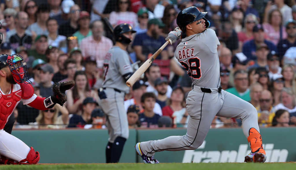 Detroit Tigers' Javier Baez hits a fourth-inning three- run home run during a baseball game against the Boston Red Sox, Sunday, Sept. 28, 2025, in Boston. (AP Photo/Jim Davis)