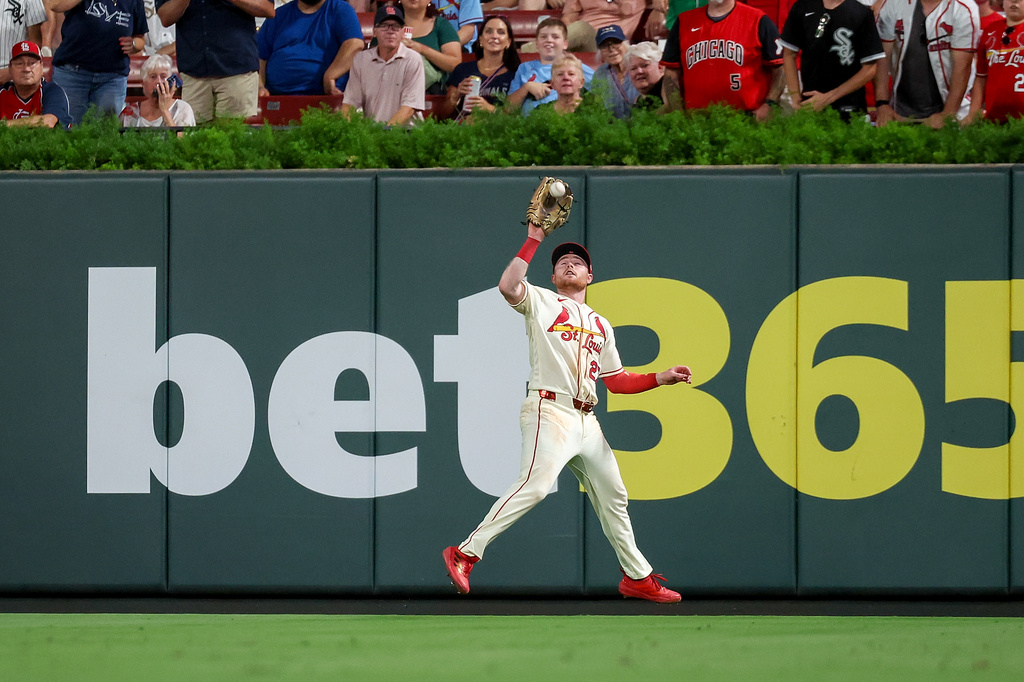 St. Louis Cardinals' Nathan Church catches a fly ball for an out against Chicago White Sox's Miguel Vargas during the seventh inning of a baseball game Saturday, Sept. 12, 2026, in St. Louis. (AP Photo/Scott Kane)