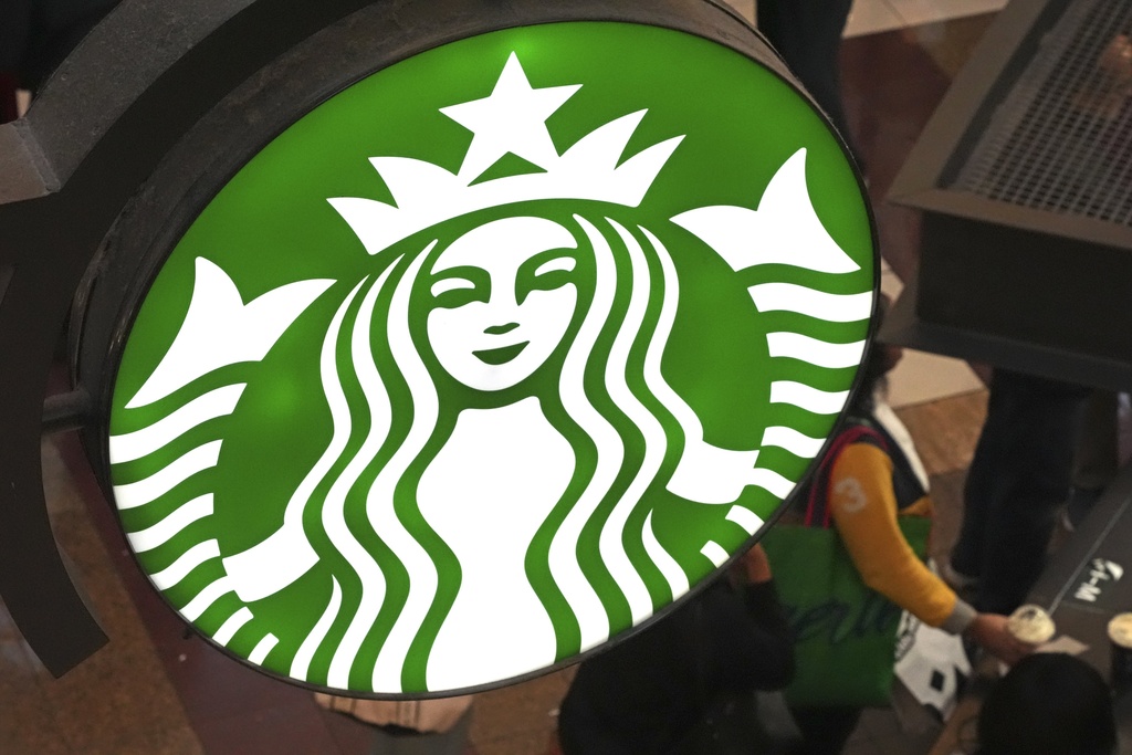 FILE - The Starbucks sign is seen at a Starbucks kiosk in the Walden Galleria in Buffalo, NY., Nov. 29, 2024. (AP Photo/Gene J. Puskar, File)