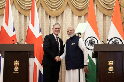 Britain's Prime Minister Keir Starmer, left, and India's Prime Minister Narendra Modi shake hands after delivering a statement to the press at Raj Bhavan in Mumbai, India Thursday, Oct. 9, 2025. (Stefan Rousseau/Pool Photo via AP) Britain's Prime Minister Keir Starmer, left, and India's Prime Minister Narendra Modi shake hands after delivering a statement to the press at Raj Bhavan in Mumbai, India Thursday, Oct. 9, 2025. (Stefan Rousseau/Pool Photo via AP)
