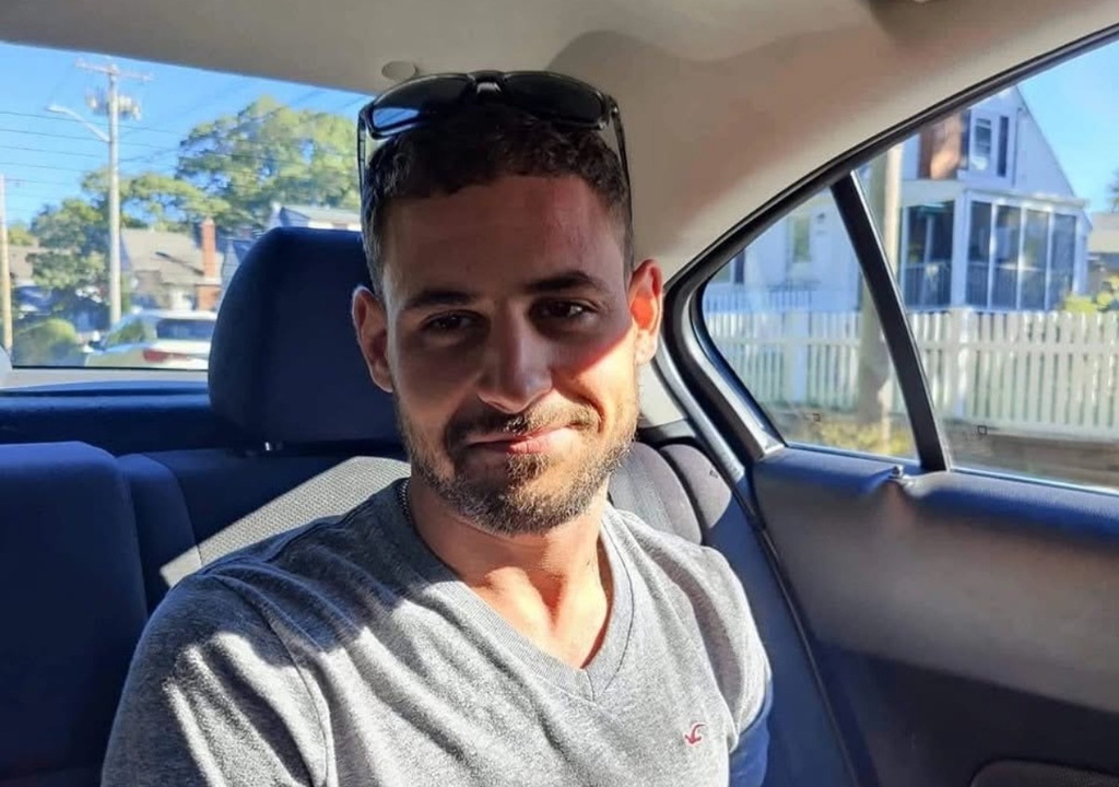 In an undated photo taken on the North Shore in Massachusetts, John Rousanidis is pictured. (Keri Rousanidis via AP)