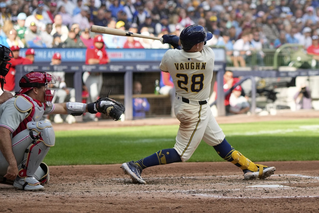 Milwaukee Brewers' Andrew Vaughn hits a double during the sixth inning of a baseball game against the Philadelphia Phillies Thursday, Sept. 4, 2025, in Milwaukee. (AP Photo/Morry Gash)