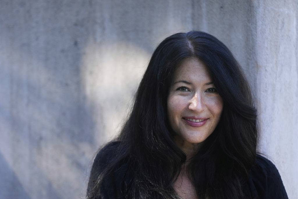 Ada Limón, 24th Poet Laureate of the United States, poses in Sonoma County, Calif., on Friday, Aug. 22, 2025. (AP Photo/Jeff Chiu)