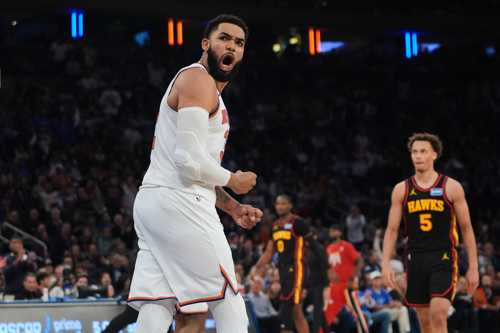 New York Knicks' Karl-Anthony Towns celebrates during the second half in Game 1 of a first-round NBA playoffs basketball series against the Atlanta Hawks, Saturday, April 18, 2026, in New York. (AP Photo/Frank Franklin II)