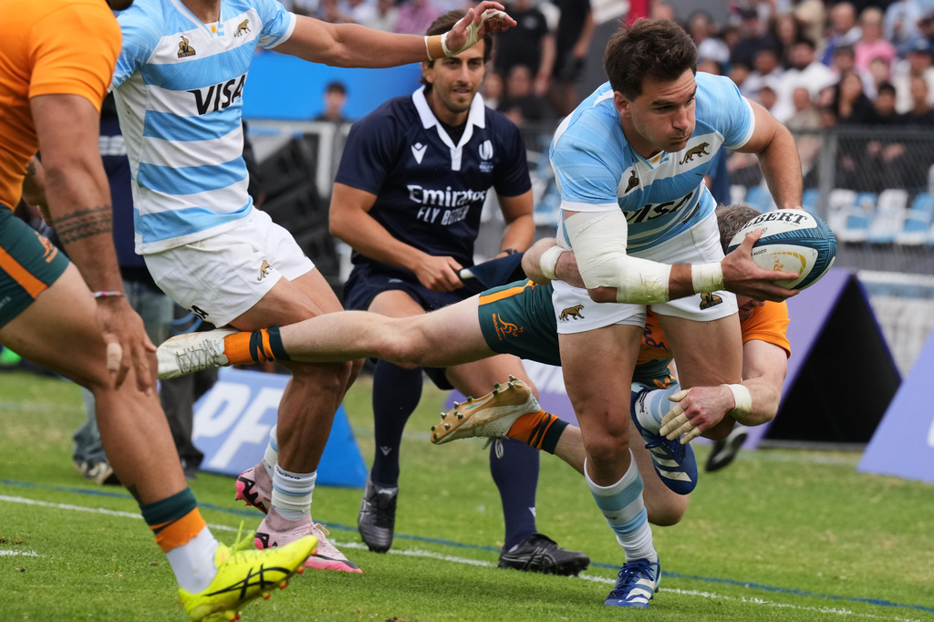 Argentina Simon Benitez Cruz is tackled by Australia Ryan Lonergan during a rugby test match in Jujuy, Argentina, Saturday, Aug. 29, 2026. (AP Photo/Gustavo Garello)