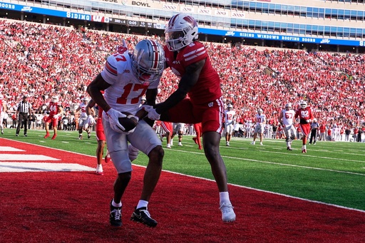 Ohio State's Carnell Tate catches a touchdown pass in front of Wisconsin's Omillio Agard during the first half of an NCAA college football game Saturday, Oct. 18, 2025, in Madison, Wis. (AP Photo/Morry Gash) Ohio State's Carnell Tate catches a touchdown pass in front of Wisconsin's Omillio Agard during the first half of an NCAA college football game Saturday, Oct. 18, 2025, in Madison, Wis. (AP Photo/Morry Gash)