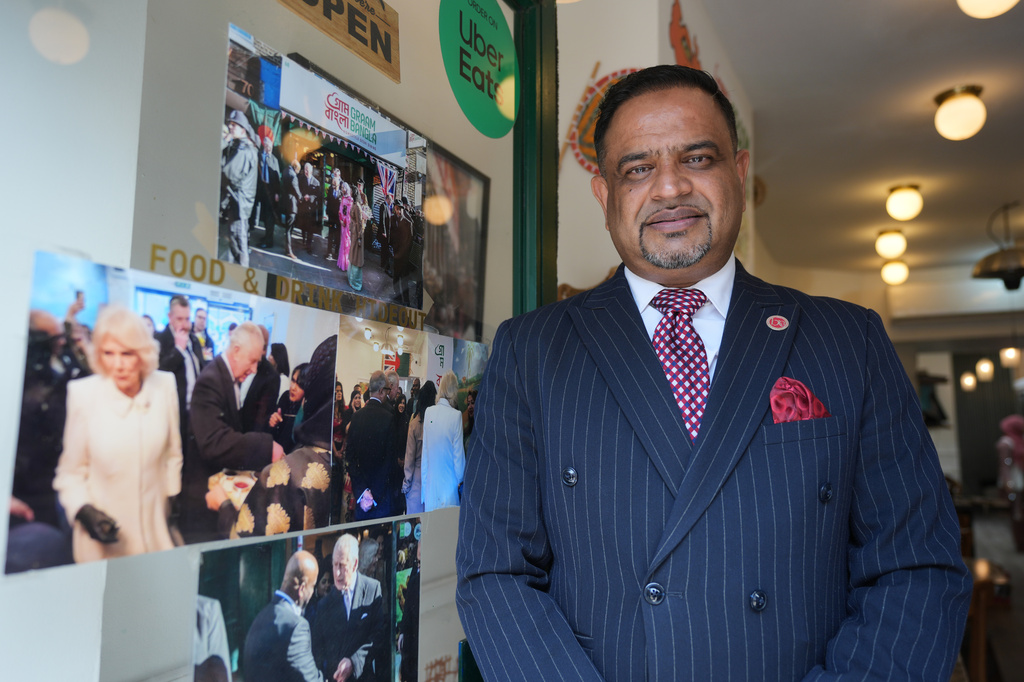 Oli Khan, president of the Bangladesh Caterers Association UK, poses for a portrait at a Bangladeshi restaurant in London, Thursday, June 18, 2026. (AP Photo/Kin Cheung) Corrects title from vice president to president.