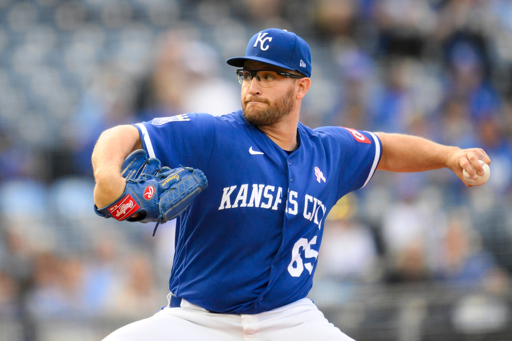 Kansas City Royals starting pitcher Noah Cameron throws to a Detroit Tigers batter during the first inning of a baseball game in Kansas City, Mo., Sunday, May 10, 2026. (AP Photo/Reed Hoffmann)