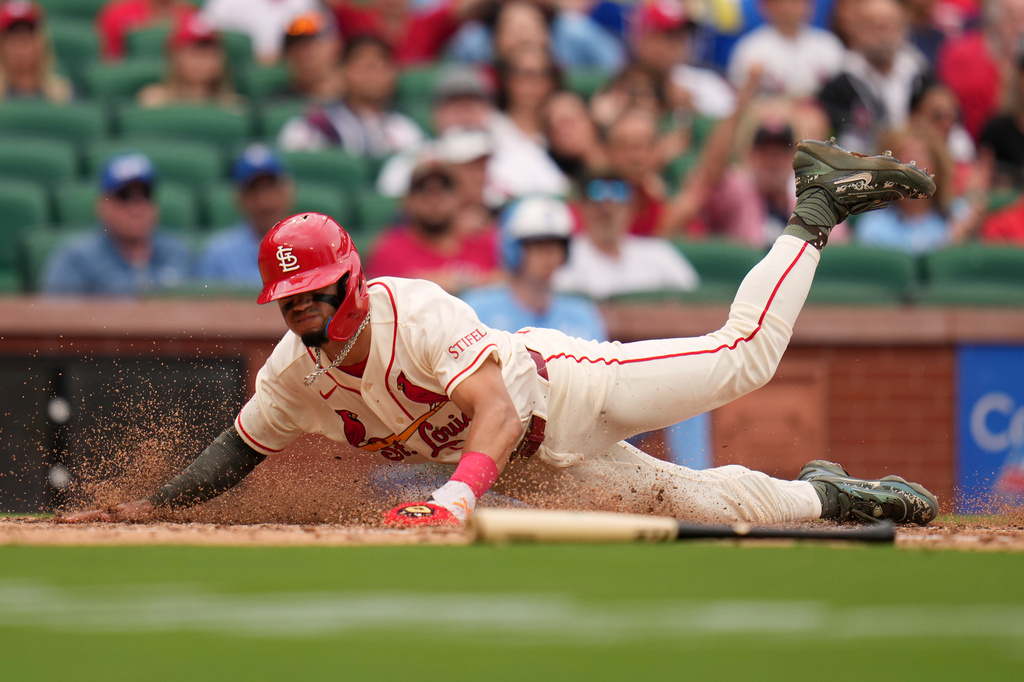 St. Louis Cardinals' Masyn Winn scores during the eighth inning of a baseball game against the Kansas City Royals Saturday, May 16, 2026, in St. Louis. (AP Photo/Jeff Roberson)