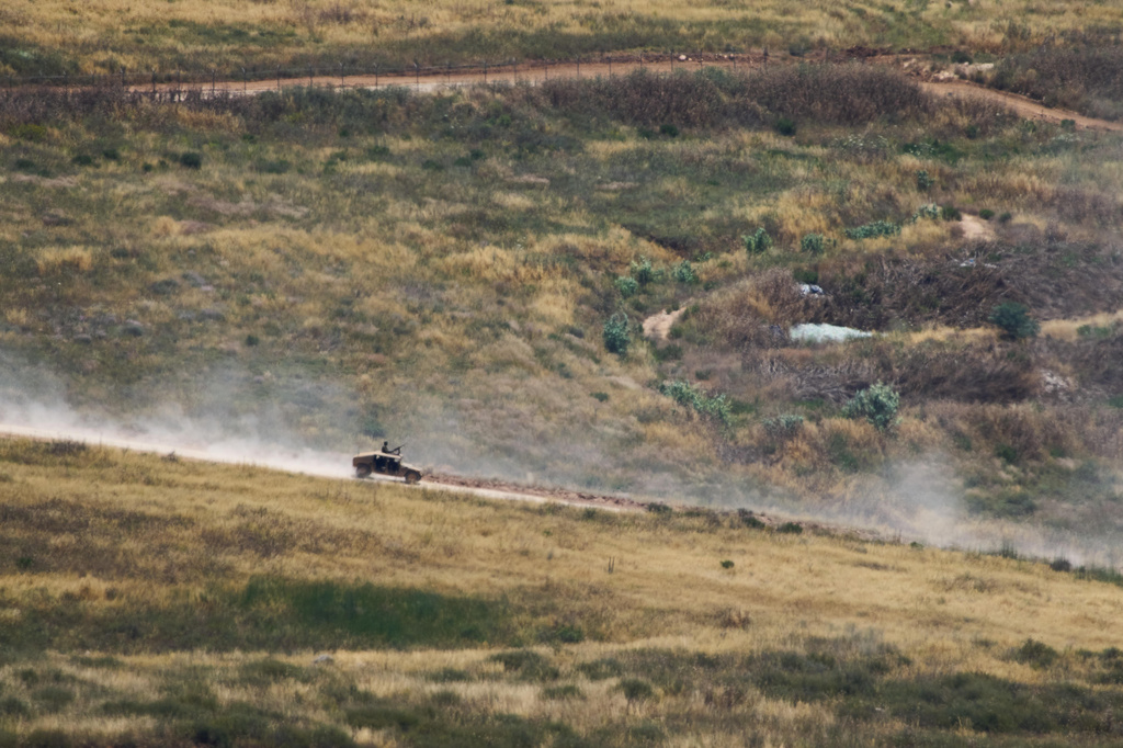 Israeli soldiers drive in southern Lebanon as seen from northern Israel, Thursday June 4, 2026. (AP Photo/Ariel Schalit)