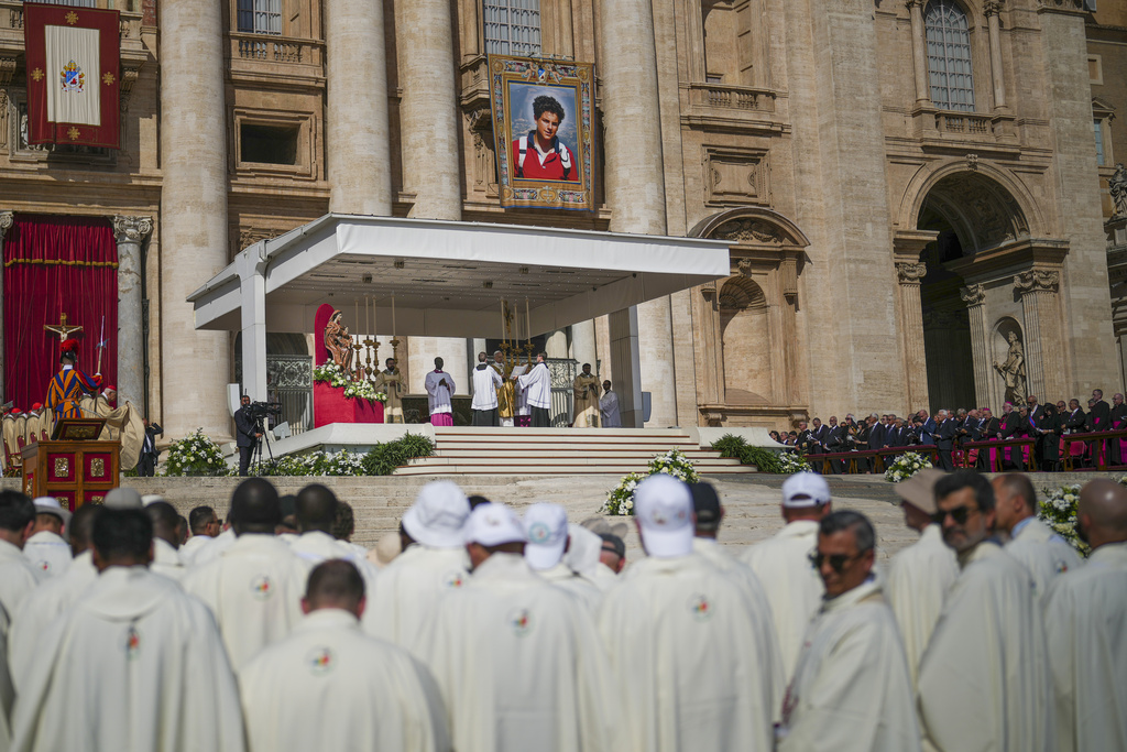 Pope Leo XIV celebrates the canonization Mass of Carlo Acutis and Pier Giorgio Frassati in St. Peter's Square at the Vatican Sunday, Sept. 7, 2025. (AP Photo/Andrew Medichini)