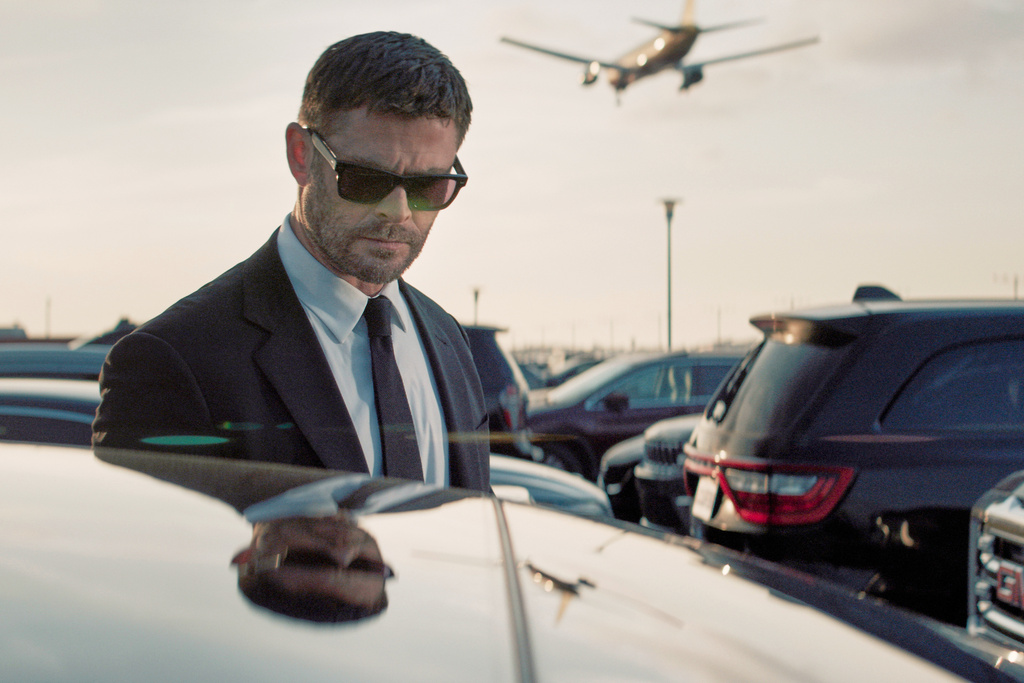 This image released by Amazon MGM Studios shows Chris Hemsworth in a scene from "Crime 101." (Amazon MGM Studios via AP)