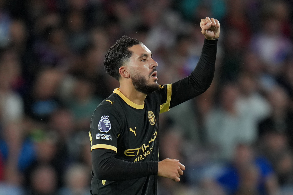 Manchester City's Rayan Cherki celebrates after scoring his side's second goal during the English Premier League soccer match between Crystal Palace and Manchester City in London, Friday, Aug. 28, 2026. (AP Photo/Kin Cheung)