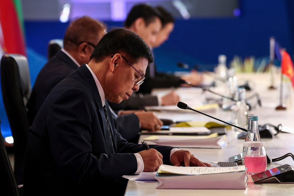 Thailand's Foreign Minister Sihasak Phuangketkeow takes a note as he attends the Association of Southeast Asian Nations (ASEAN) Foreign Ministers' Meeting ahead of the 48th ASEAN Summit and Related Meetings in Cebu, Philippines, Thursday, May 7, 2026. (Eloisa Lopez/Pool Photo via AP)