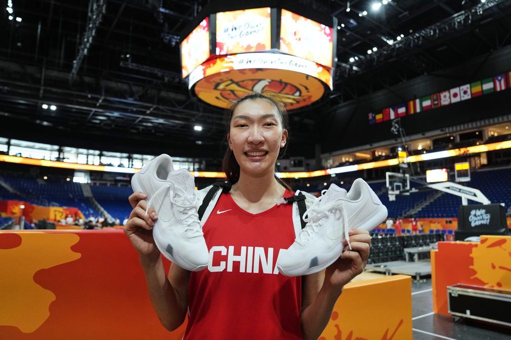 Han Xu of China poses for a photo after a training session ahead of their match against United States during the Women's Basketball World Cup, at the Uber arena in Berlin, Germany, Wednesday, Sept. 2, 2026. (AP Photo/Ebrahim Noroozi)