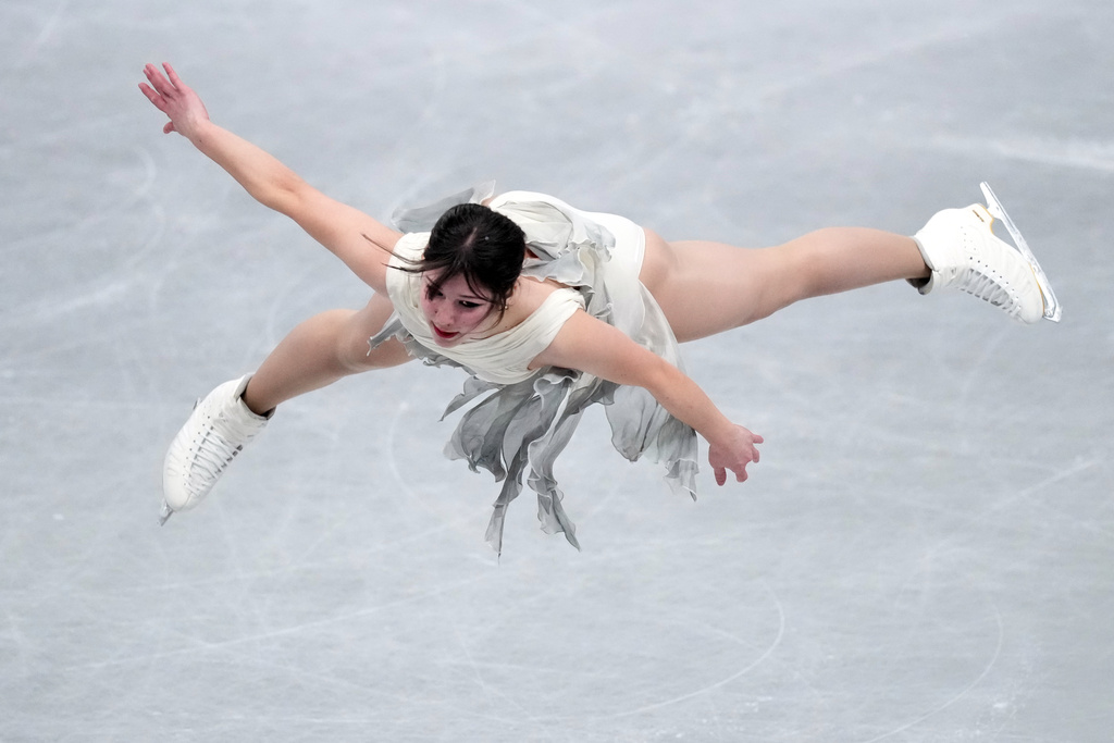 Alysa Liu, of the United States, competes in the women's short program segment at the ISU Grand Prix of Figure Skating Final in Nagoya, central Japan, Friday, Dec. 5, 2025. (AP Photo/Hiro Komae)