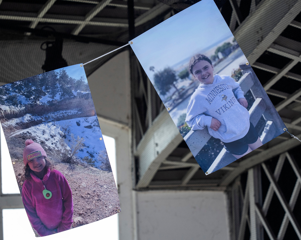 Images of Harper Moyski hung over the stage at the celebration of life for school-shooting victim Harper Moyski at the Lake Harriet Bandshell in Minneapolis, Minn., on Sunday, Sept. 14, 2025 (Richard Tsong-Taatarii/Star Tribune via AP)